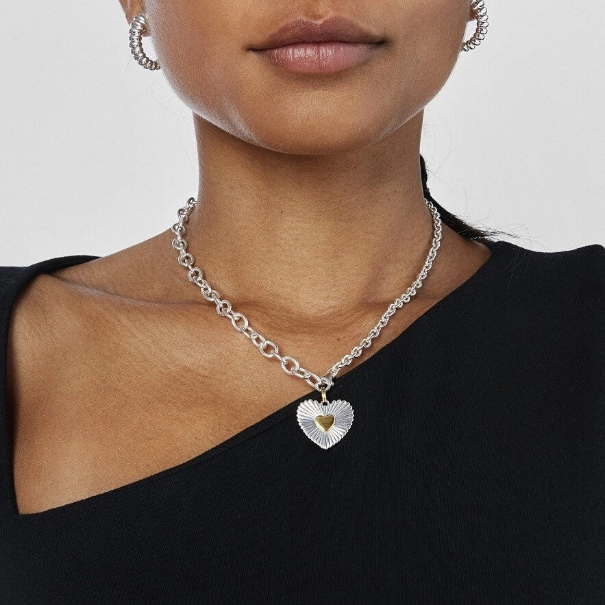 model wearing amethyst & sable aurea devotion necklace with silver and 18k gold heart pendant