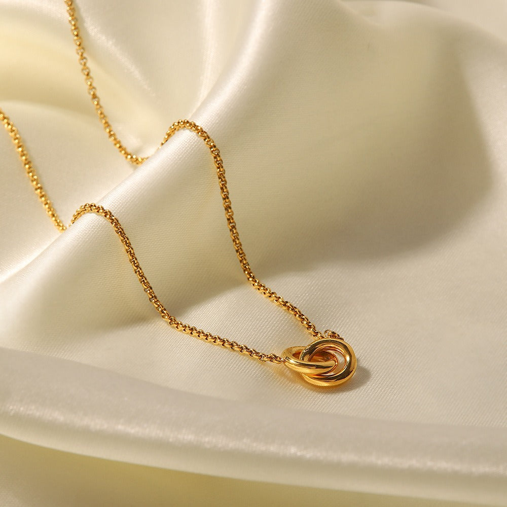 amethyst & sable aurea union necklace in 18k gold on satin surface