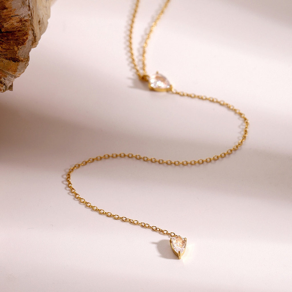 amethyst & sable luma lariat necklace in 18k gold with pear-shaped cubic zirconia stones