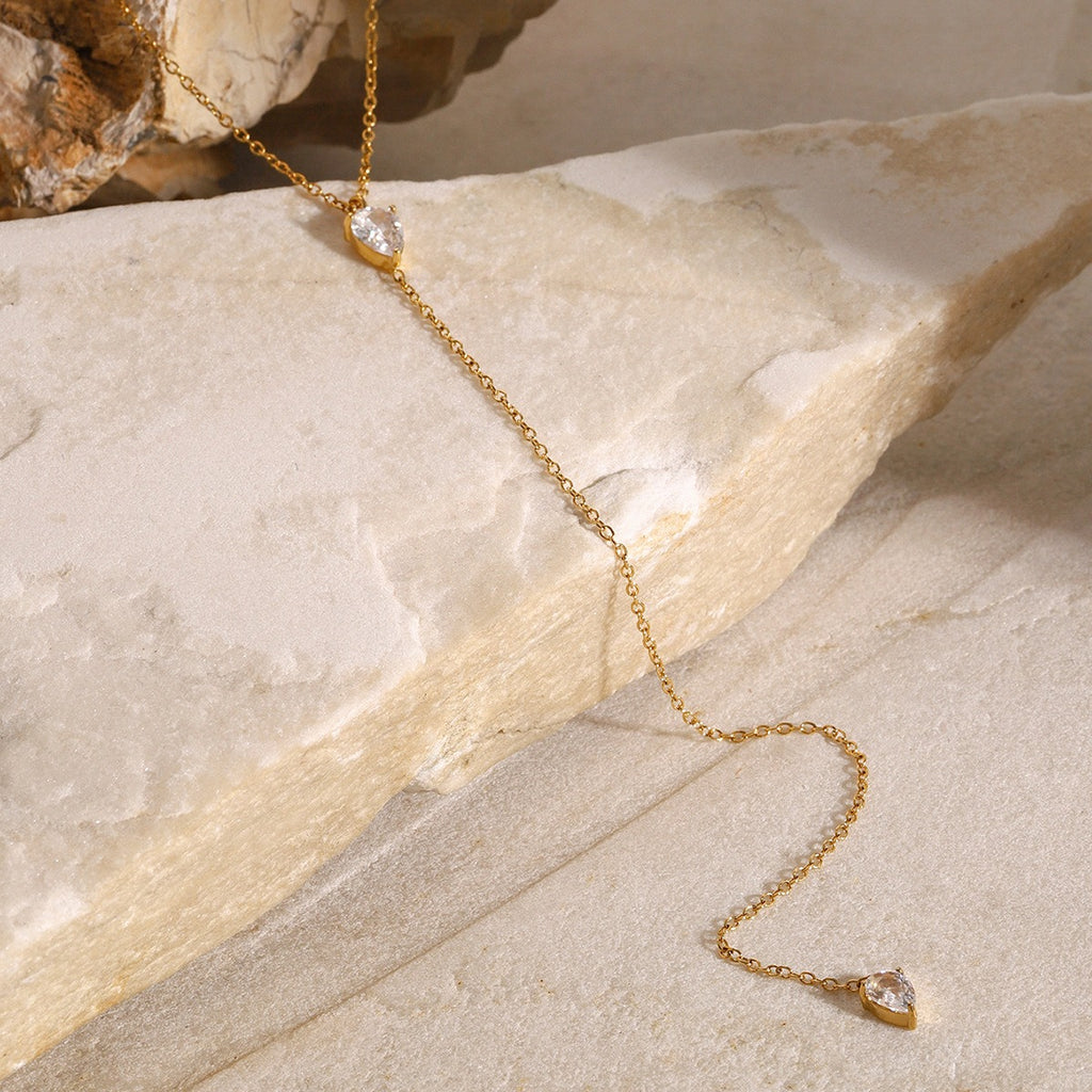 amethyst & sable luma lariat necklace in 18k gold with pear-shaped cubic zirconia stones