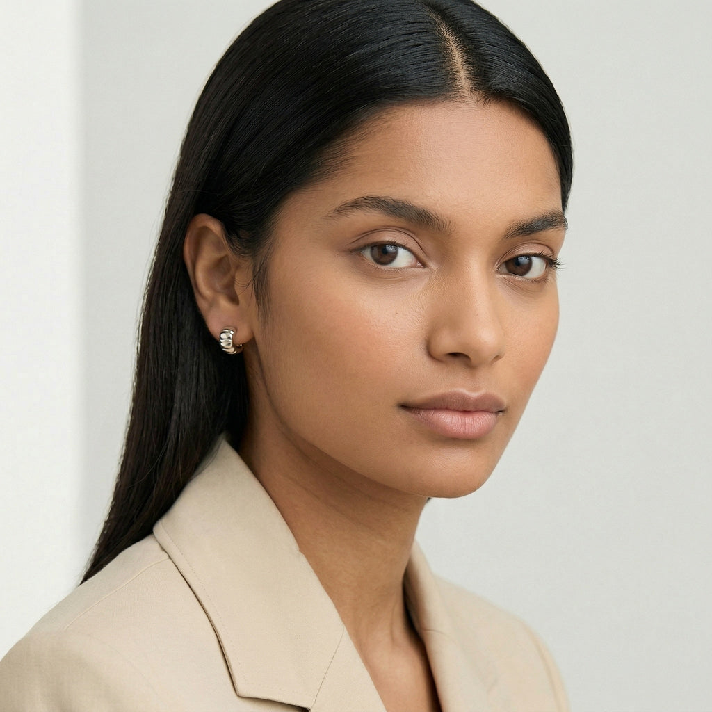 model wearing amethyst & sable aurea c-hoop earrings in silver