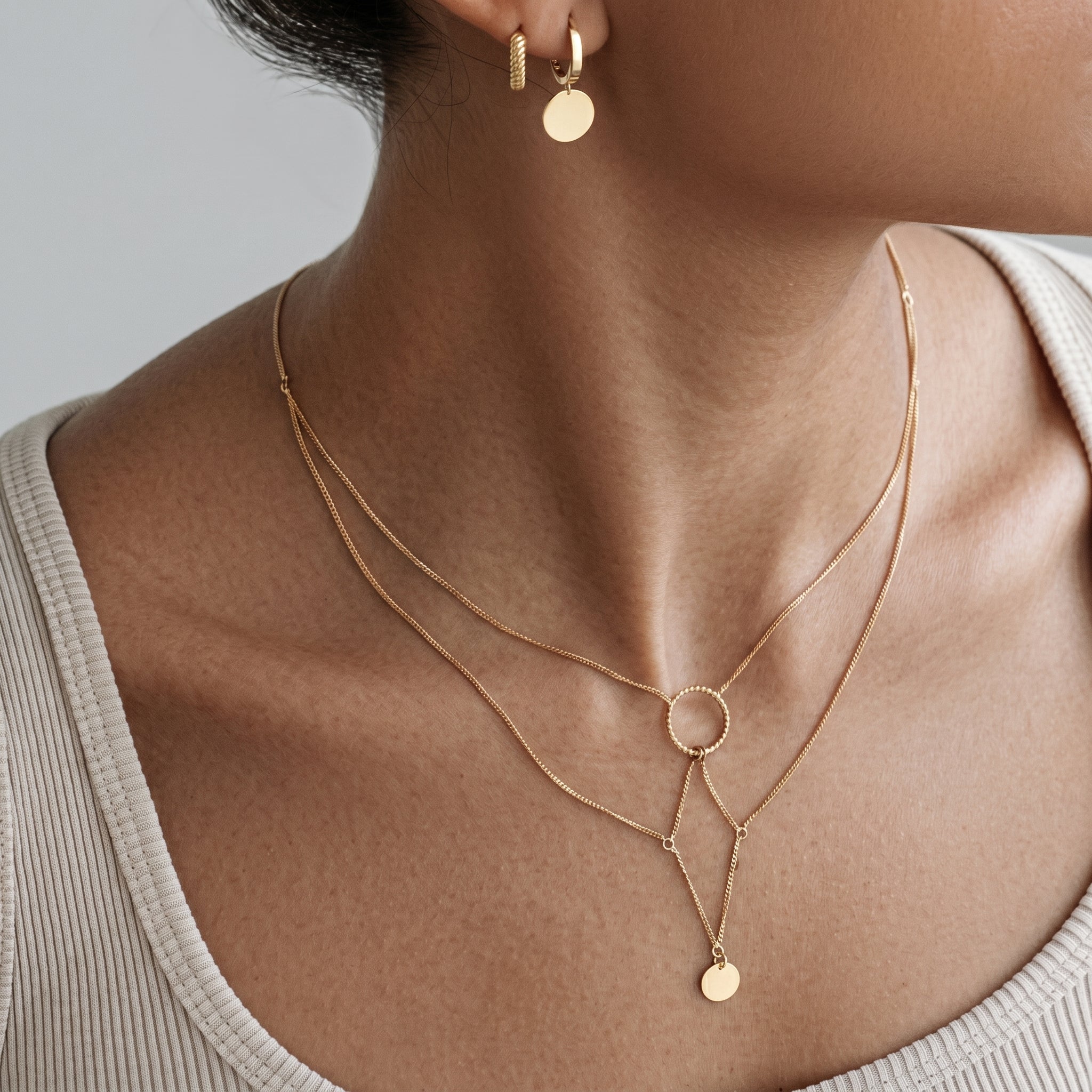 model wearing amethyst & sable aurea cascade necklace in 18k gold