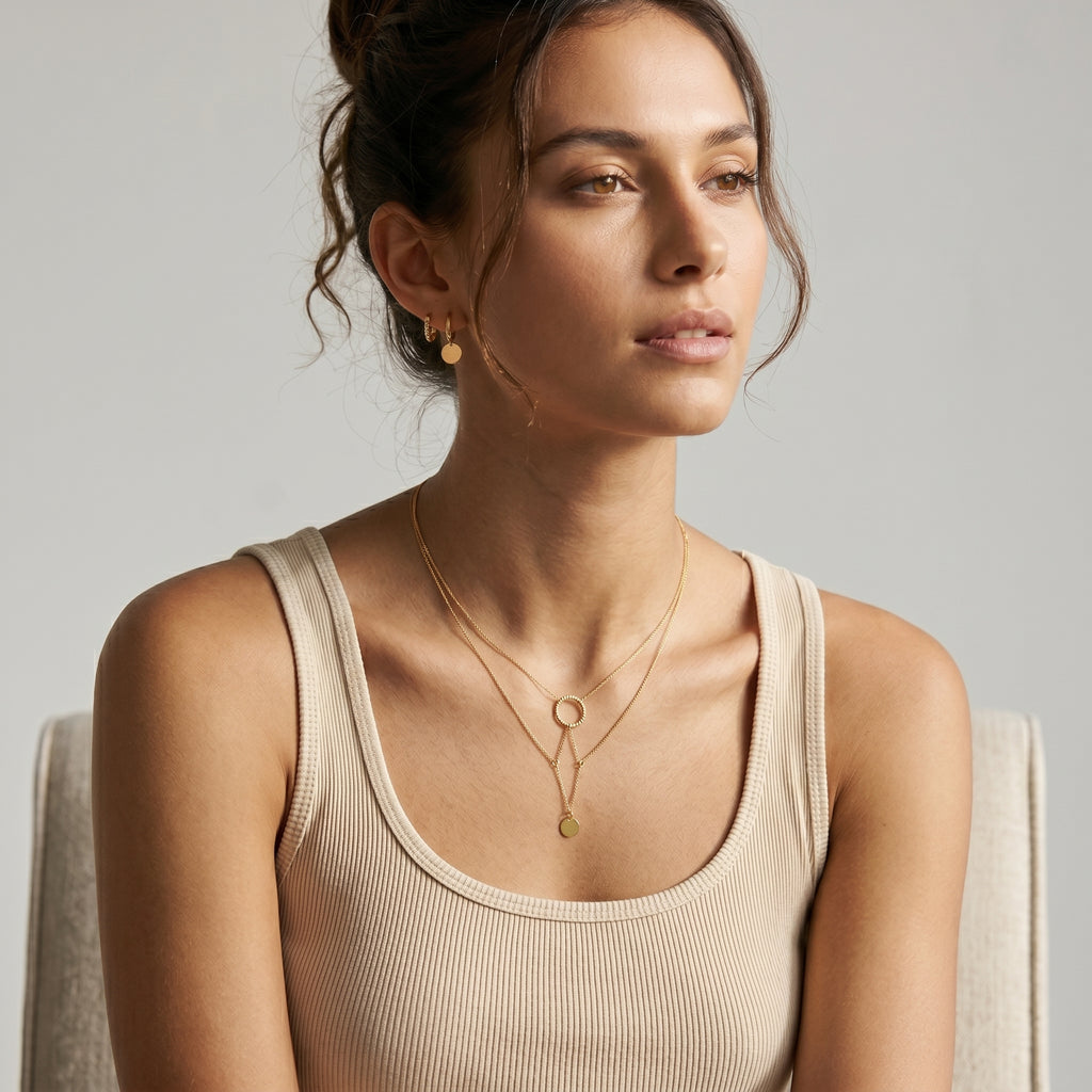 model wearing amethyst & sable aurea cascade necklace in 18k gold