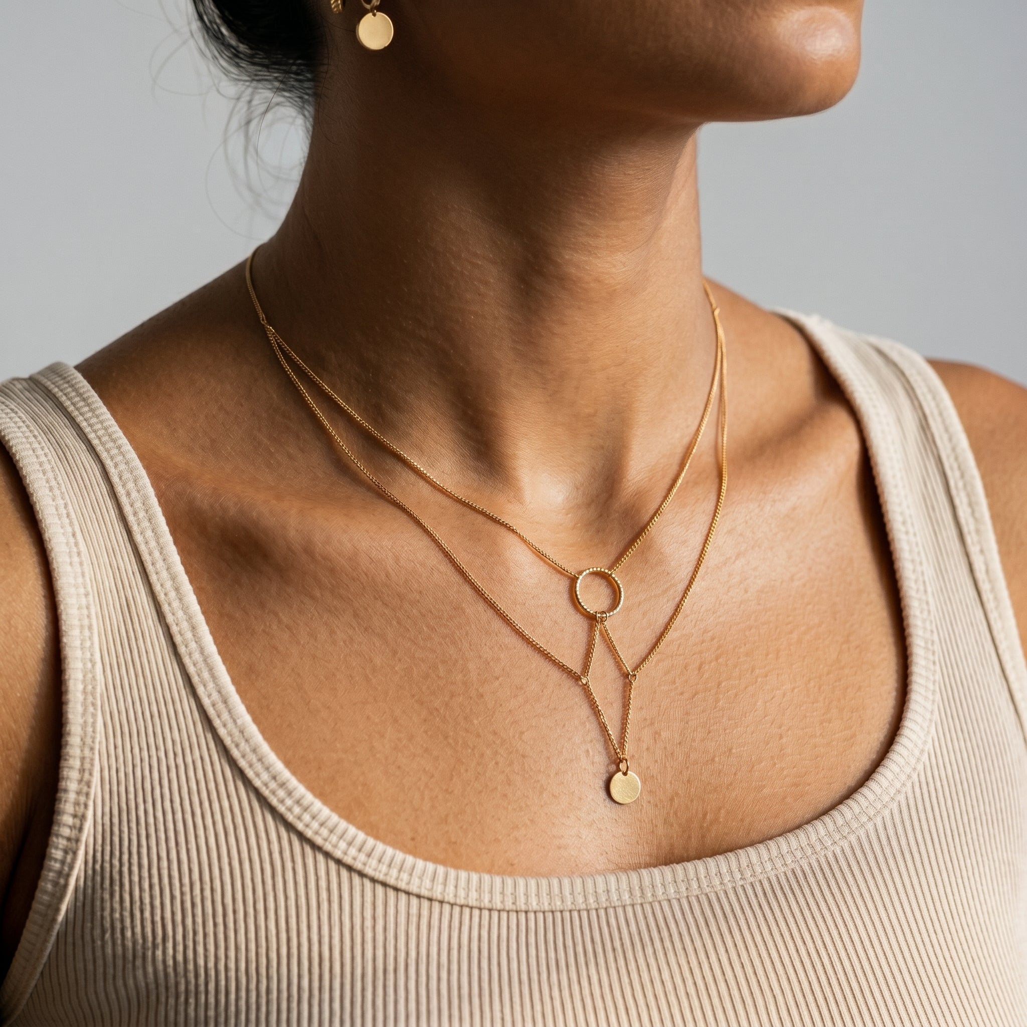 model wearing amethyst & sable aurea cascade necklace in 18k gold