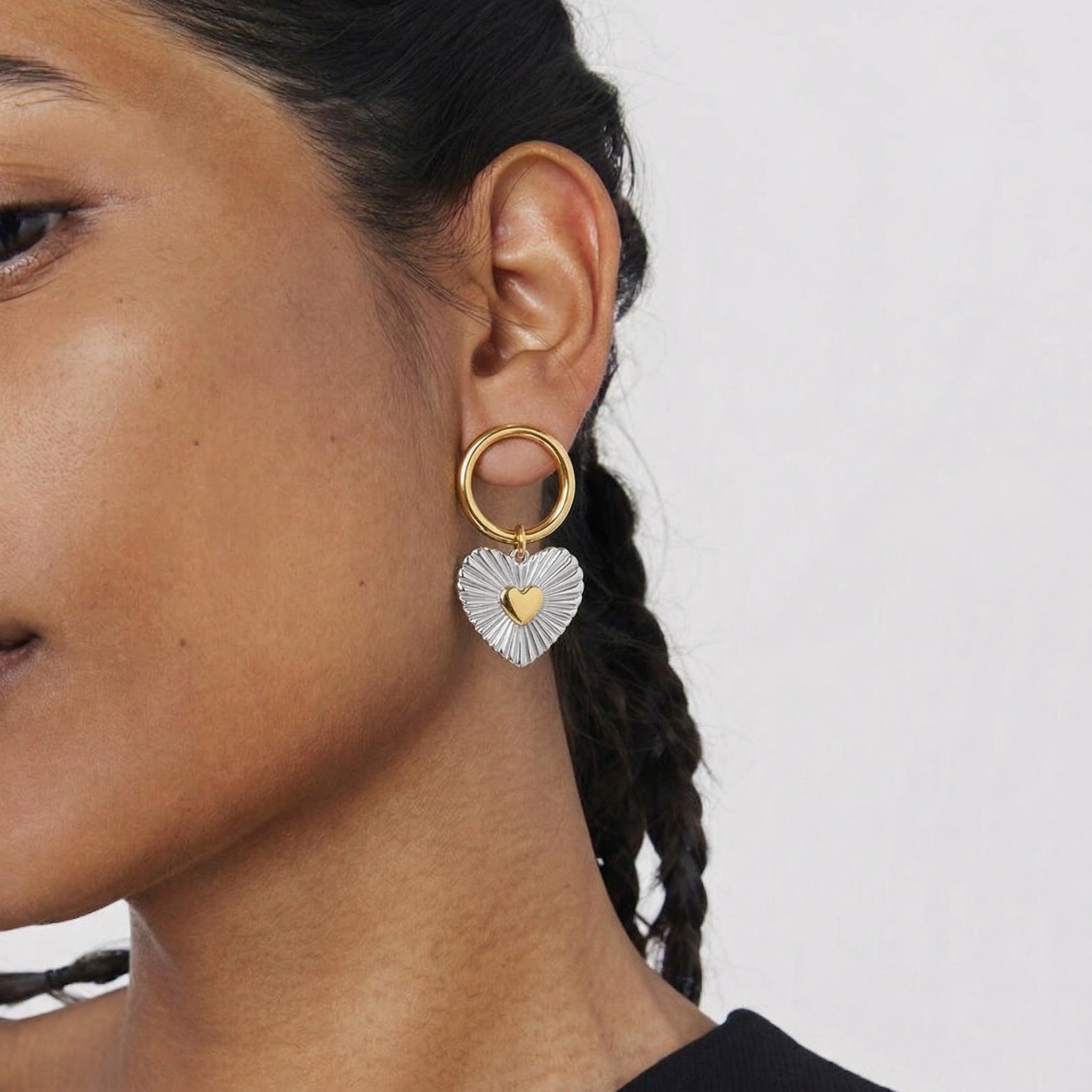 model wearing amethyst & sable aurea devotion earrings in mixed metal