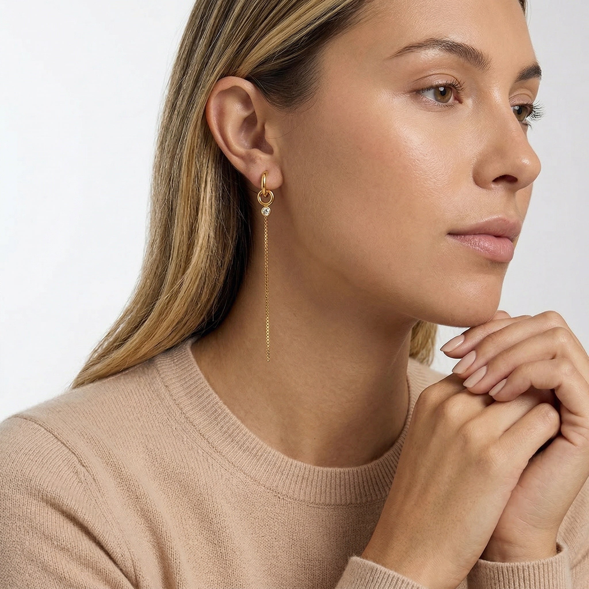 model wearing amethyst & sable aurea drop earrings in 18k gold