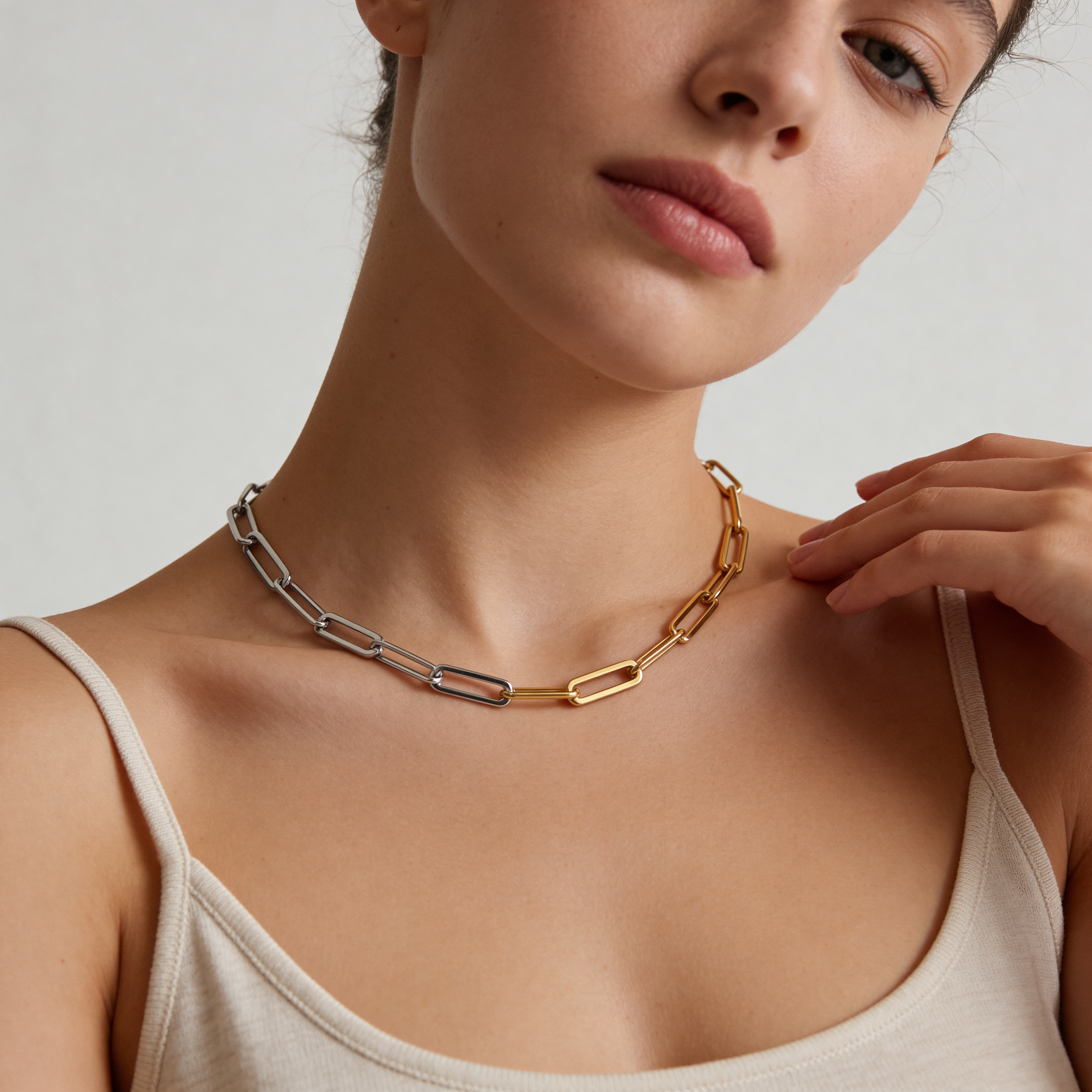 model wearing amethyst & sable axis cadence necklace in 18k gold and stainless steel