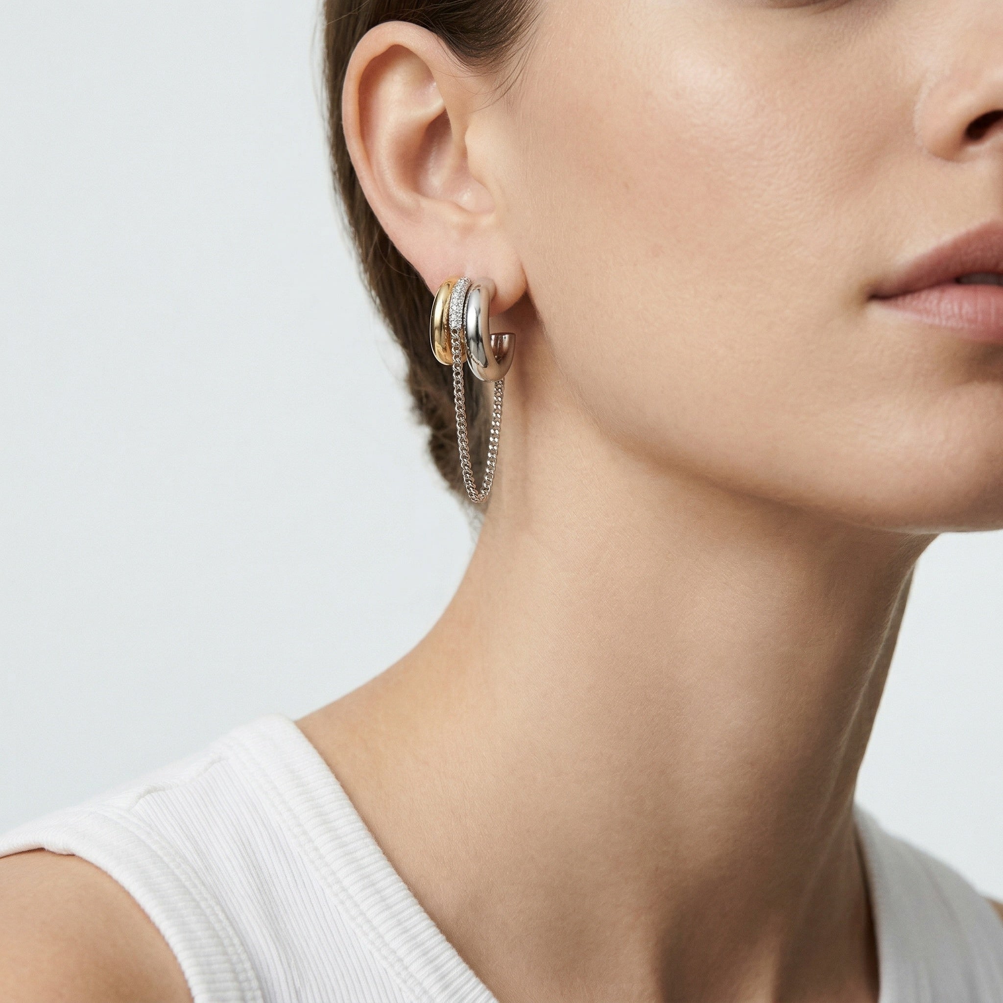model wearing amethyst & sable axis chain duo earrings in mixed metal