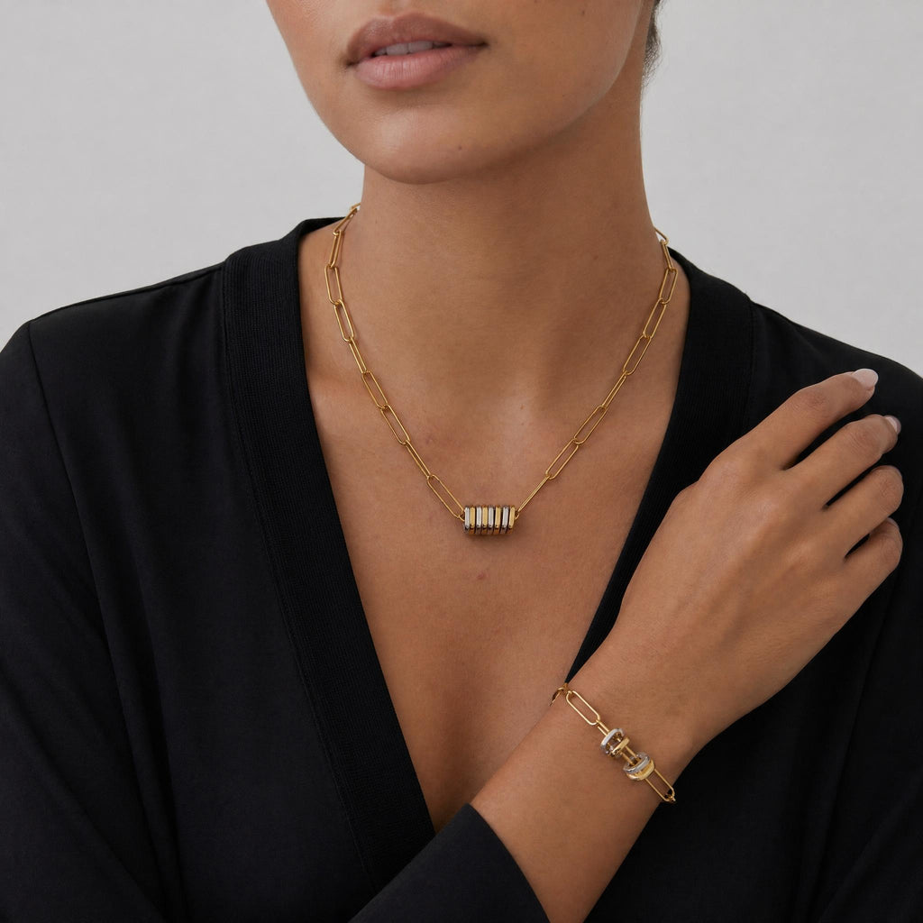 model wearing axis circuit set in 18k gold mixed metal by amethyst & sable
