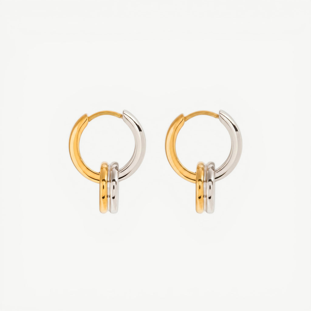 two-tone amethyst & sable axis cross over hoop earrings in 18k gold and stainless steel