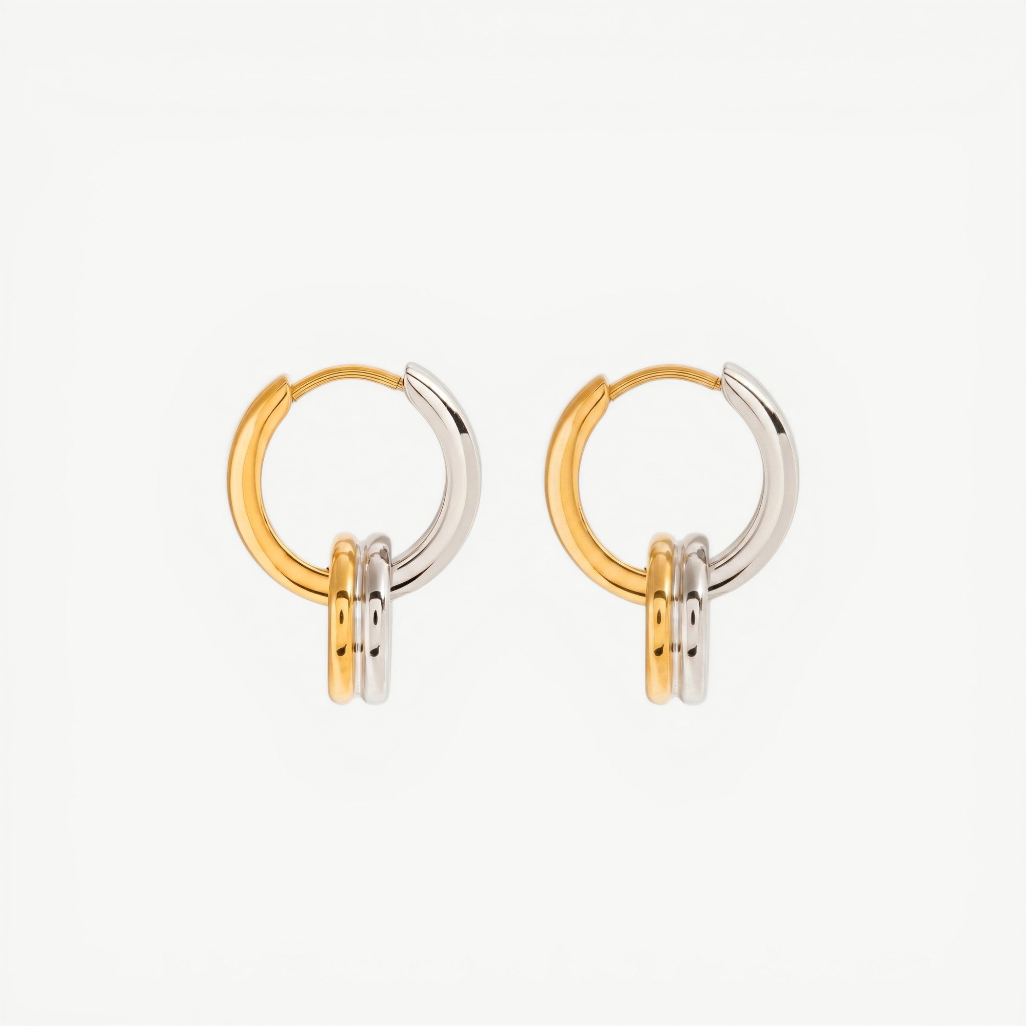 two-tone amethyst & sable axis cross over hoop earrings in 18k gold and stainless steel