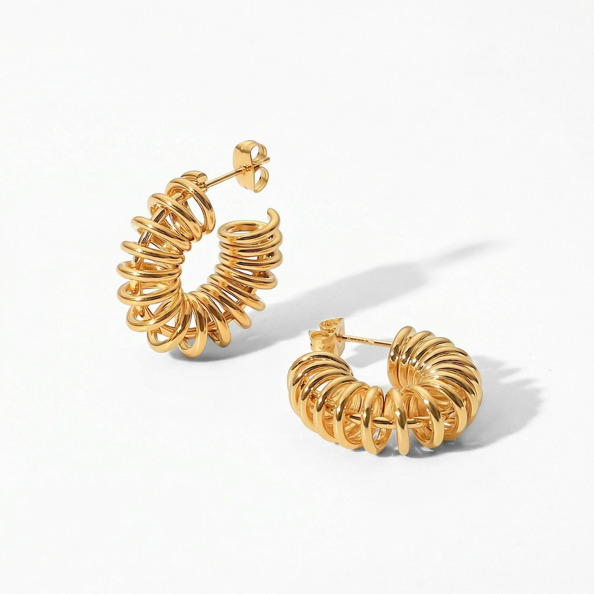 amethyst & sable axis current earrings in 18k gold