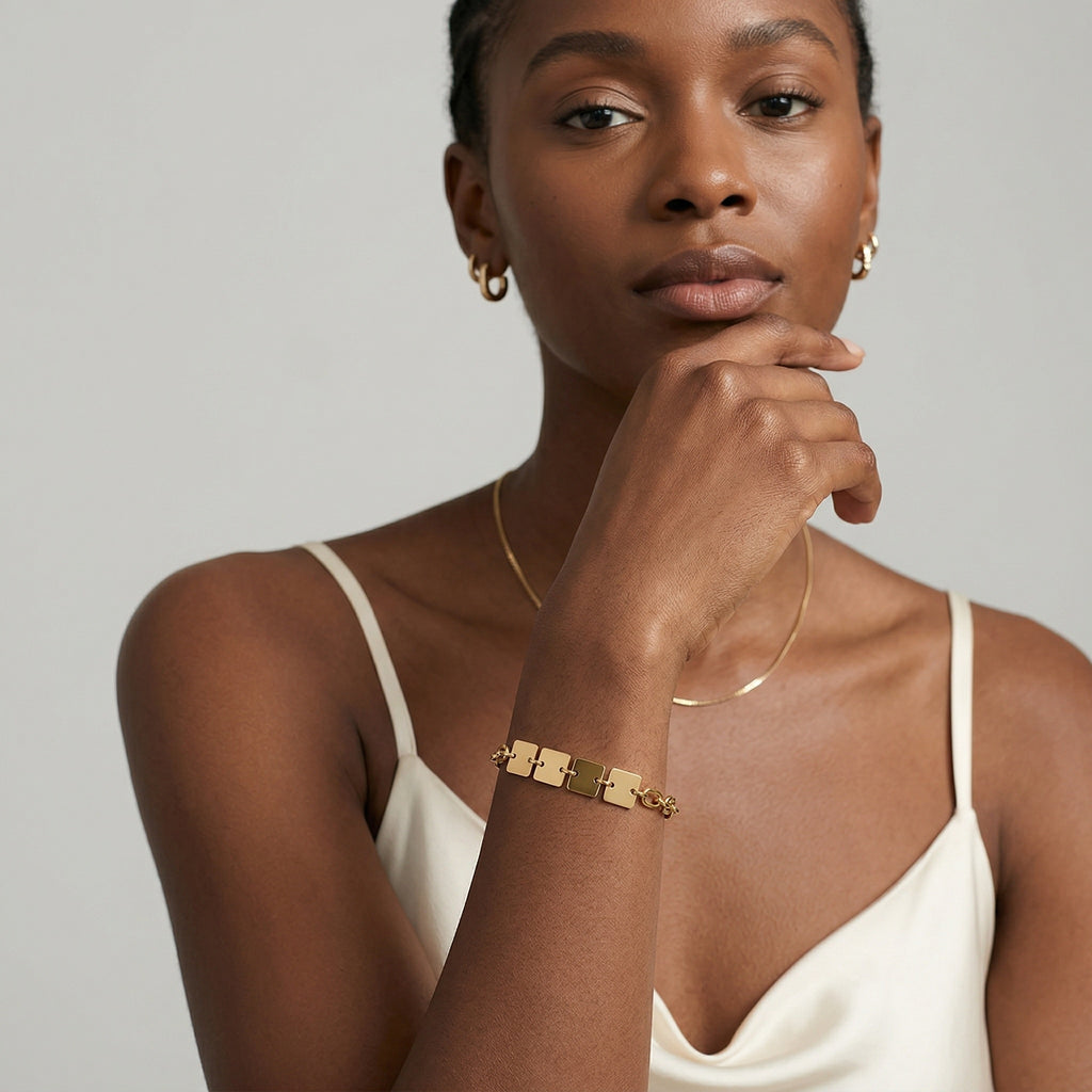 model wearing amethyst & sable axis facet bracelet in 18k gold