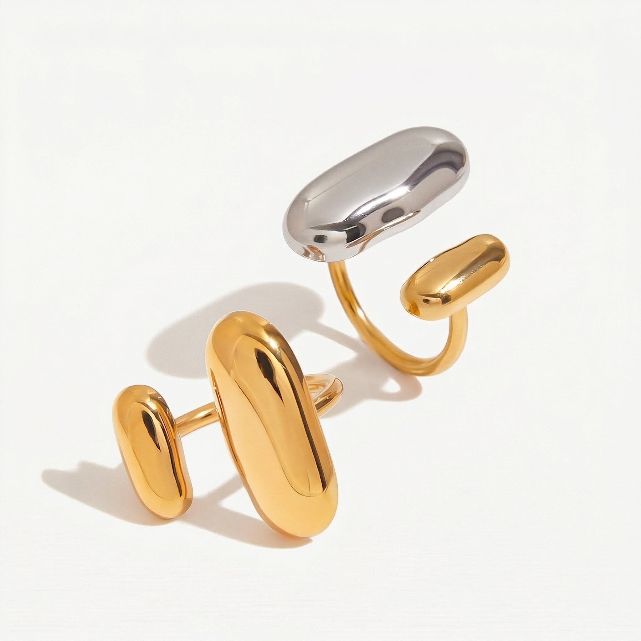 amethyst & sable axis form rings in gold and mixed metal