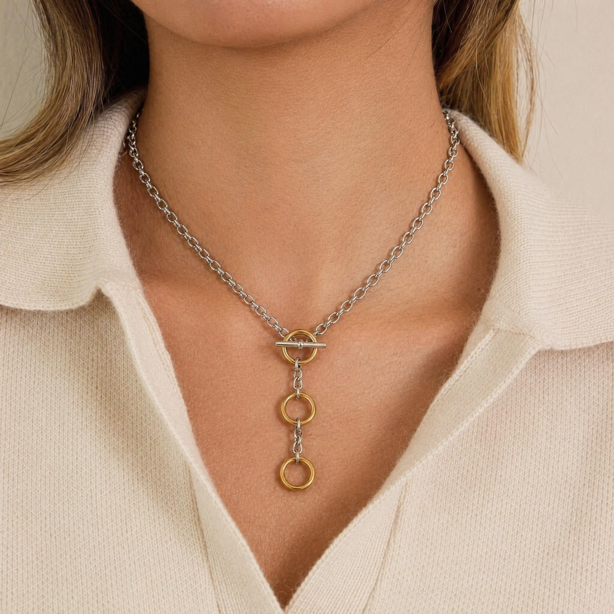 model wearing amethyst & sable axis mixed link necklace in 18k gold and stainless steel
