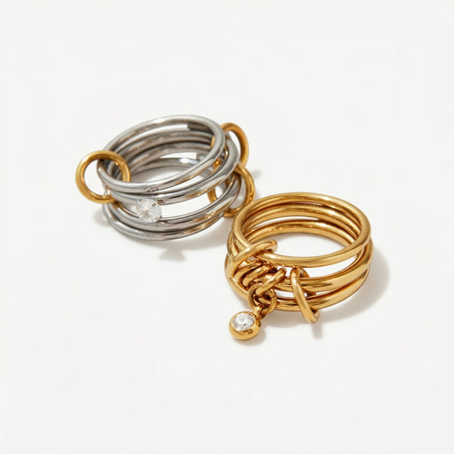 amethyst & sable axis stack rings in 18k gold and stainless steel mixed metal