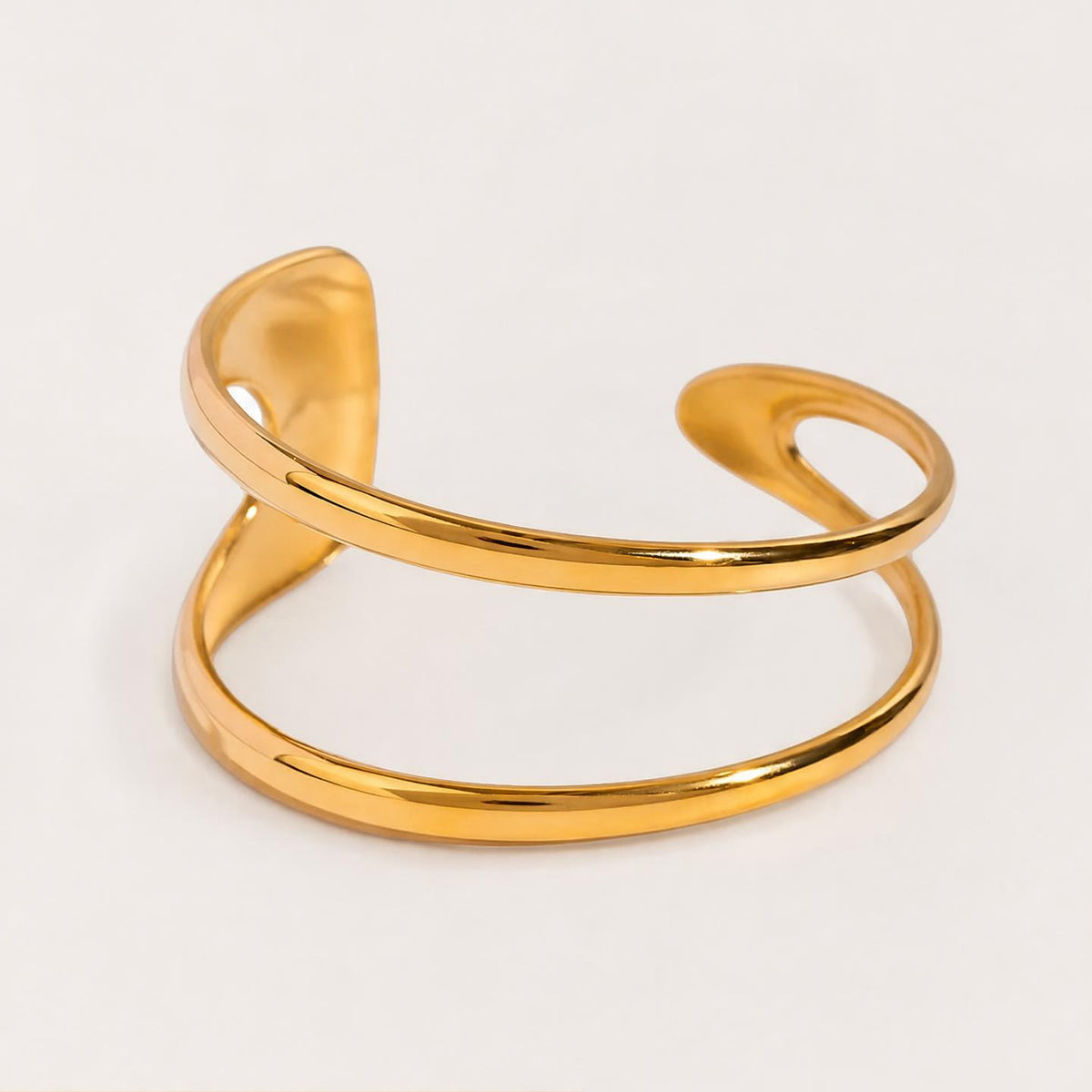 Axis Strata Cuff in polished 18K PVD gold with an open layered design