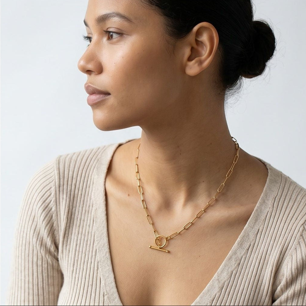 model wearing amethyst & sable axis toggle necklace in 18k gold