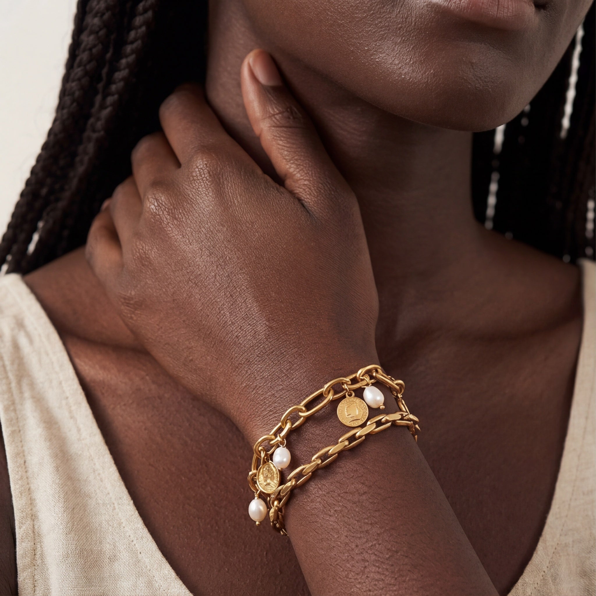 close-up of model wearing the amethyst & sable calypso marina stack bracelets