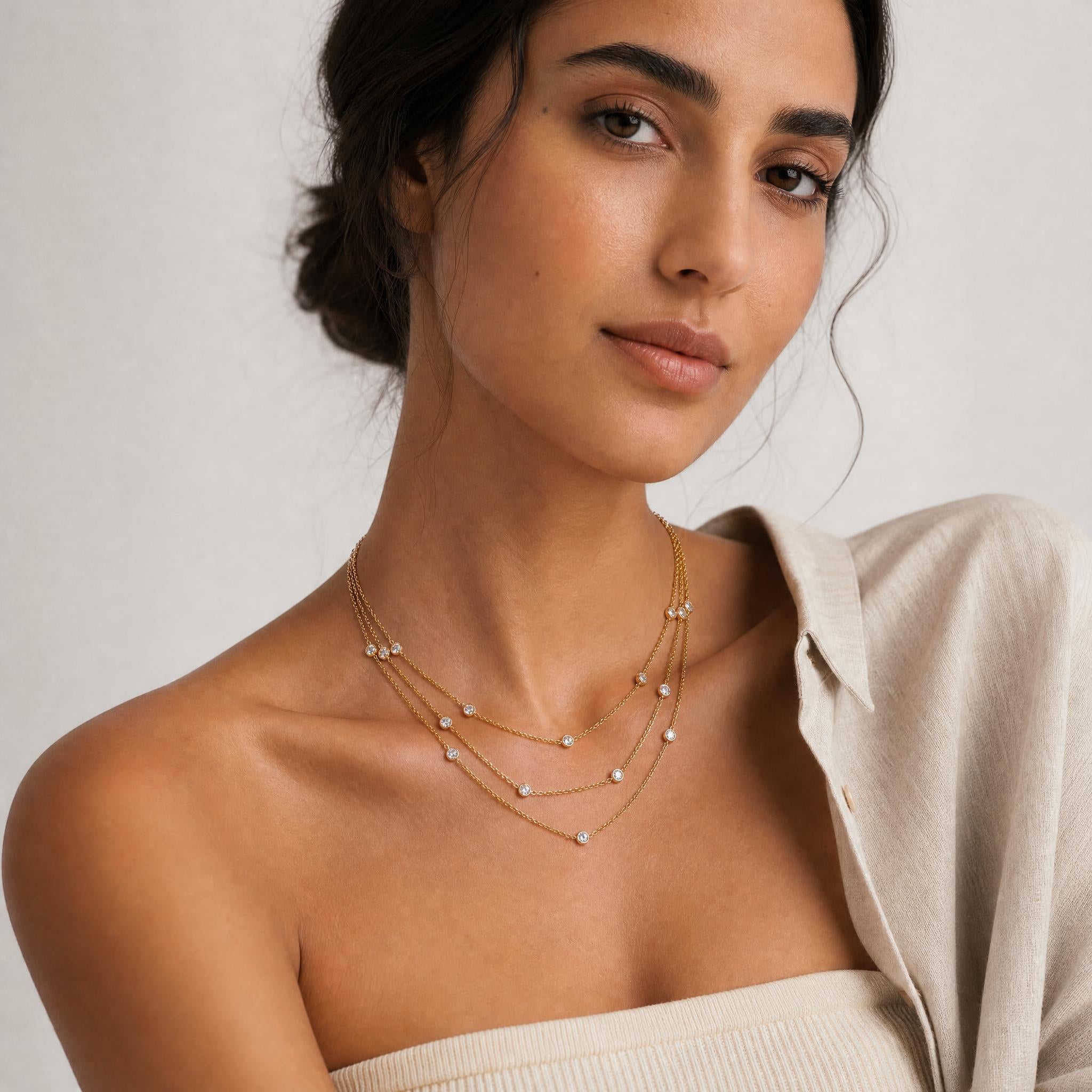 model wearing amethyst & sable luma cascade necklace in 18k gold