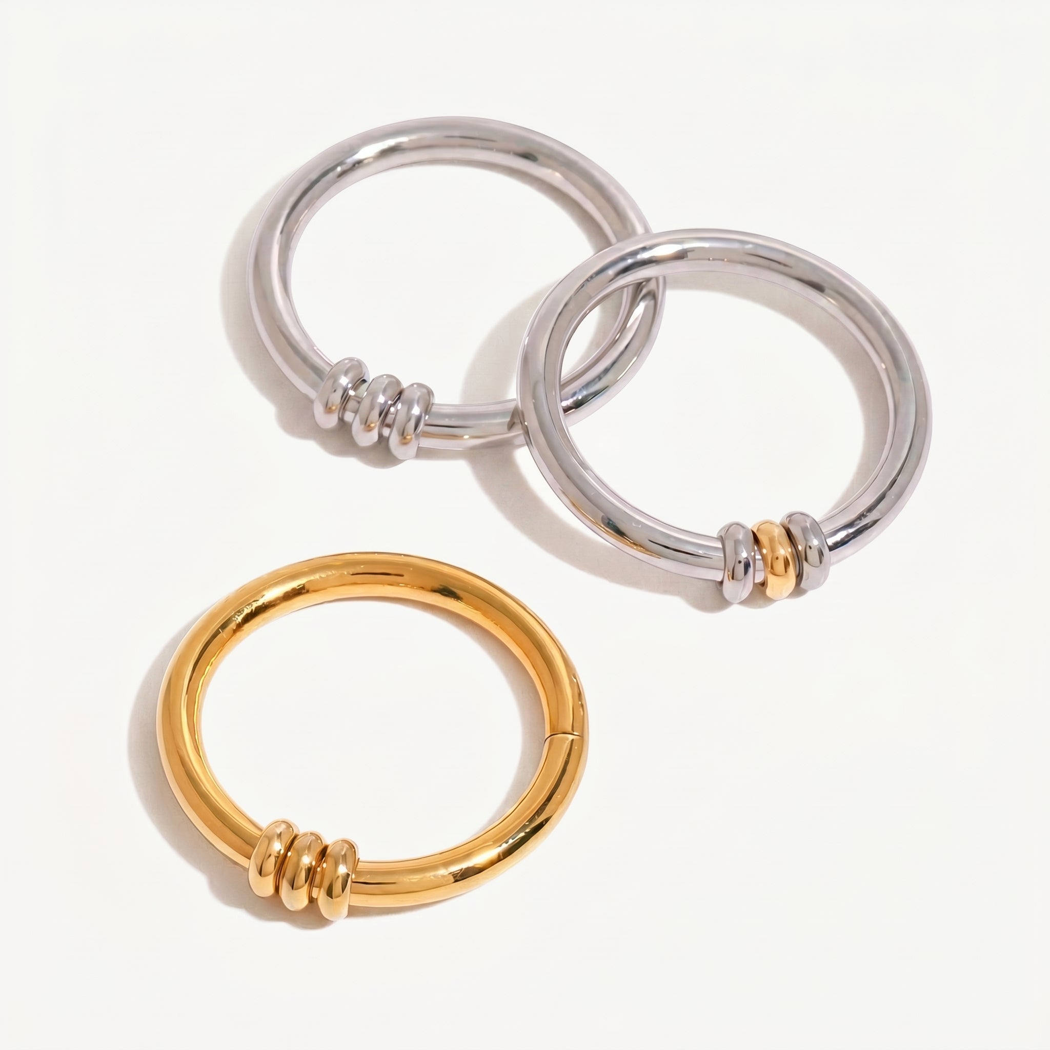 amethyst & sable axis trinity ring collection
