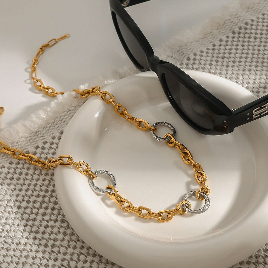 amethyst & sable two tone axis relay necklace in 18k gold and stainless steel